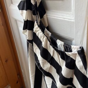 Top mil rayas asimétrico